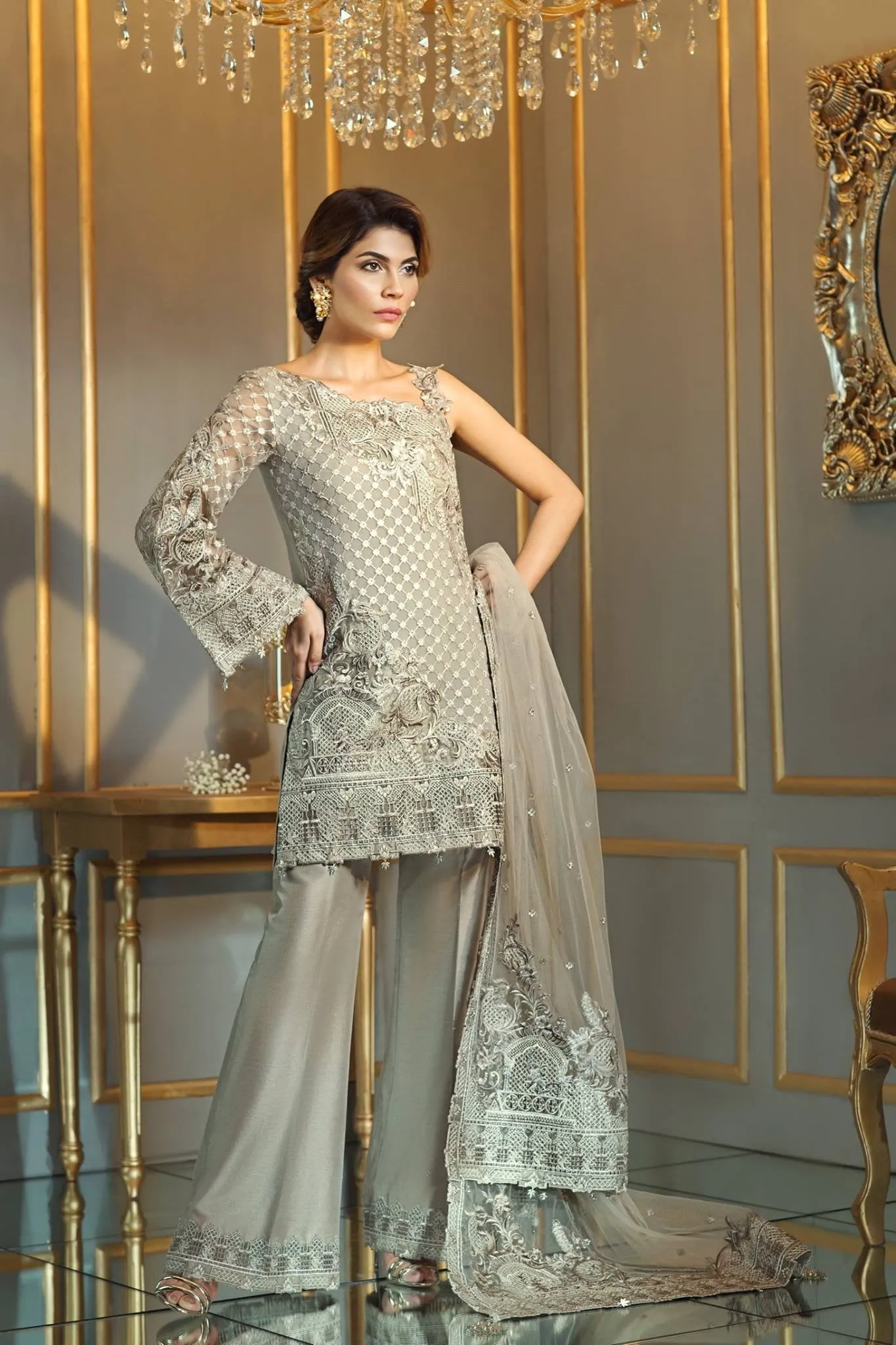 Chiffon dress by Anya in light brown color with threds embroidery and patches work Model # C 569